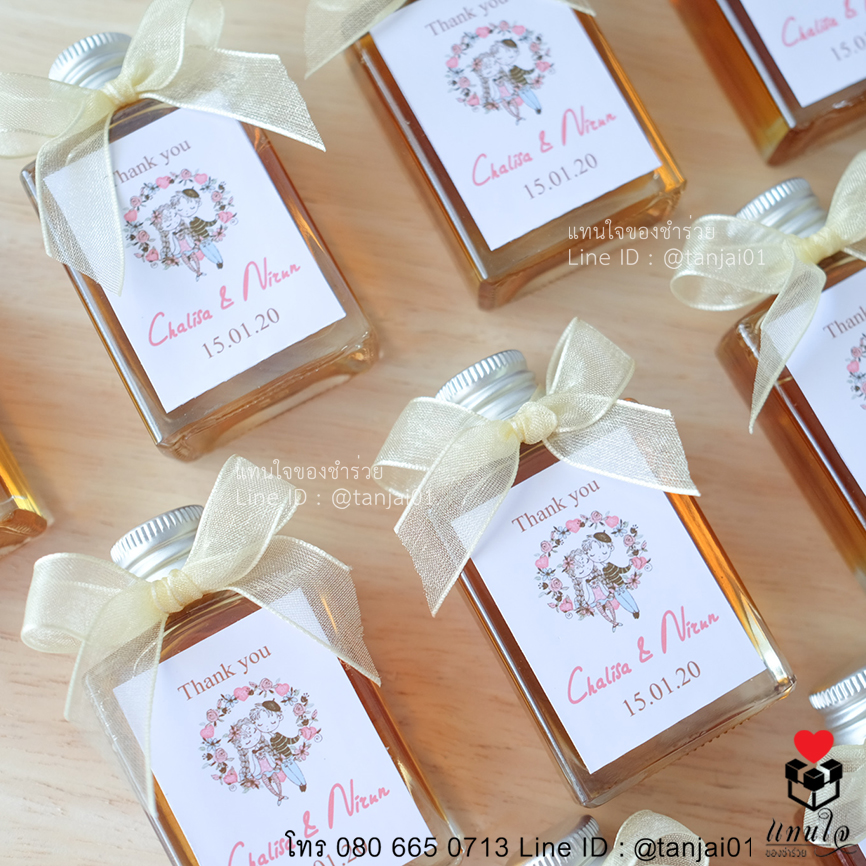 น้ำผึ้ง 40 ml ติดสติกเกอร์ ผูกโบว์(ริปบิ้น) ของชำร่วยงานแต่งงาน